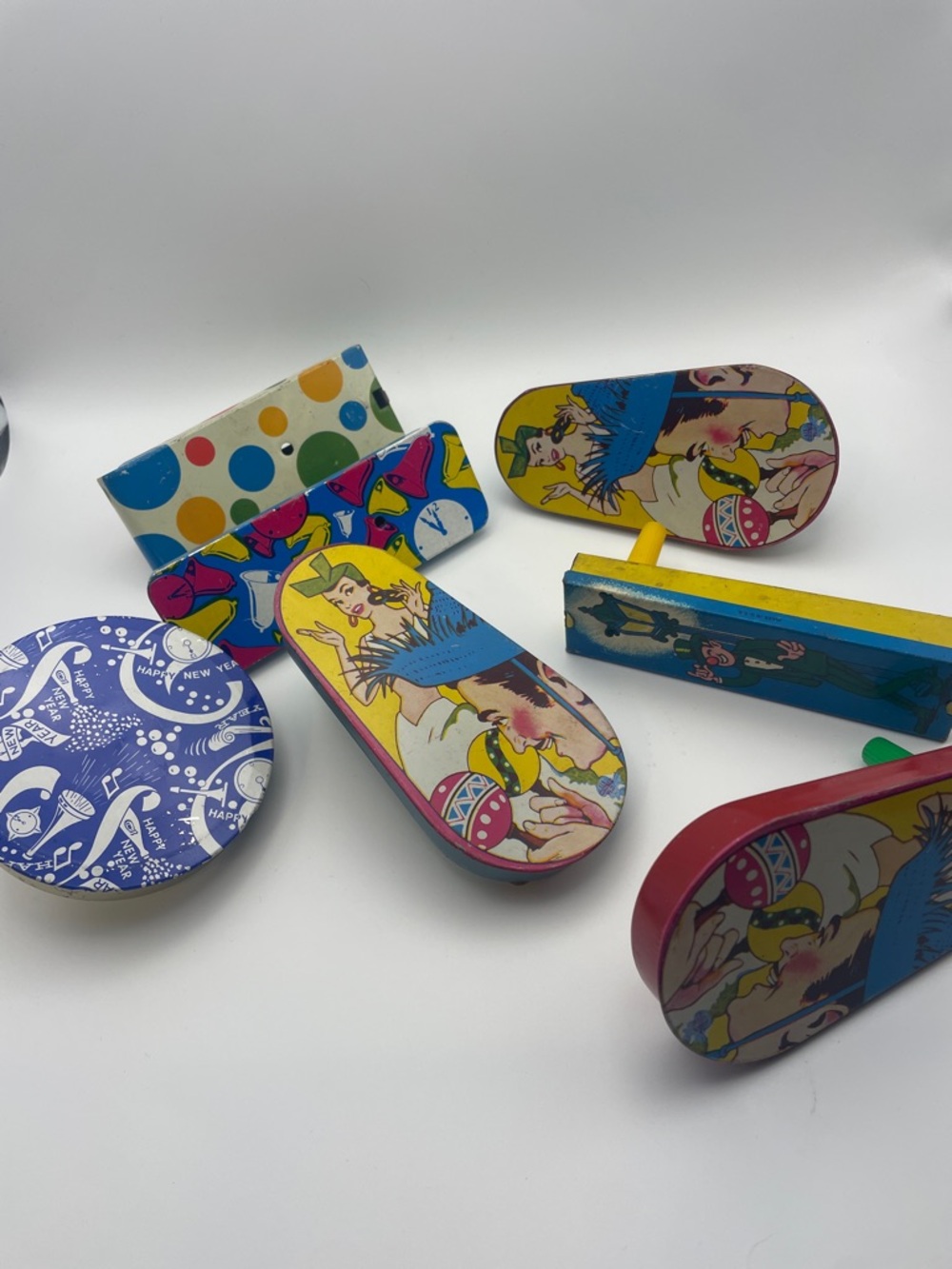 Vintage metal noisemakers